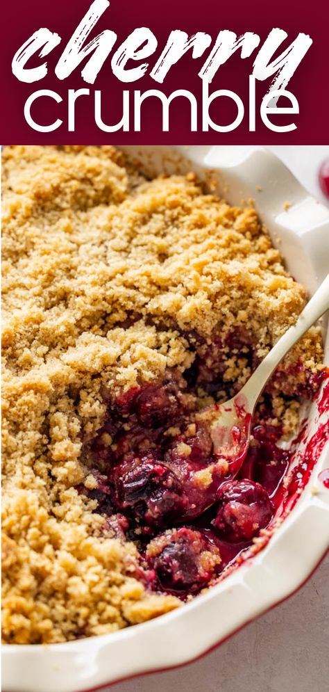 A close up view of a pan of cherry crumble with a spoon sticking out. Cherry Cobbler Fresh Cherries, Cherry Crisp Recipe With Frozen Cherries, Cherry Crisp Recipe With Canned Cherries, Cherry Crumble Pie Recipe, Sour Cherry Crumble, Berry Crisp Recipe Crumble Topping, Cherry Crisp With Frozen Cherries, Sour Cherry Crisp Recipe, Cherry Pie Crumble Topping Recipe