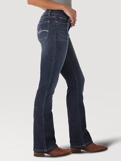 CLASSIC AND SIMPLE BOOTCUT STYLE Look no further than our essential bootcut for classic women's everyday jeans. Sitting comfortably below the waist, our women's mid-rise bootcut jeans offer a bit of stretch for casual denim that works for every occasion. The classic bootcut leg opening makes this versatile style perfect for pairing with boots or heels for an elevated look that enhances your figure. Made with the quality you've come to expect, Wrangler® jeans for women are a closet staple you can Bootcut Jeans With Boots Outfits, Bootcut Jeans Outfit With Boots, Simple Country Outfits, Wrangler Jeans Women's, Bootcut Jeans Outfit, Midrise Jeans, Wrangler Women, Ariat Jeans, Everyday Jeans