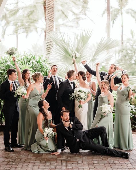 A vibrant, stylish bridal party bringing effortless energy and elegance—celebrating the newlyweds with a perfect mix of fun and sophistication. Loved the girls sage green dresses. Soooo complimentary to this venue and overall classic wedding theme. 🤍 What Color Suit Goes With Green Dress, Sage Wedding Party Attire, Wedding Party Colors Green, Sage Green And Gold Wedding Groomsmen, Sage Green Wedding Colors Groomsmen, Sage Green And Black Tux Wedding, Green Black And Champagne Wedding, Groomsmen With Sage Green Bridesmaids, Shades Of Green Bridesmaids Dresses