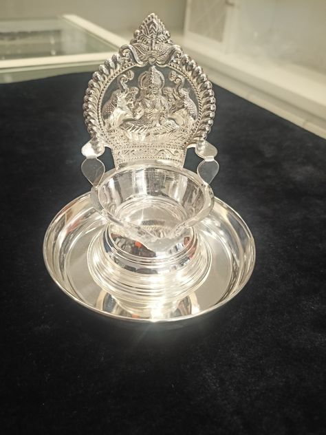 Gajalakshmi deepam with plate Kamakshi Deepam Silver, Kamakshi Deepam, Pooja Items, Silver Pooja Items, Brass Items, Gold Earrings Models, Lakshmi Images, Vedic Mantras, Silver Items