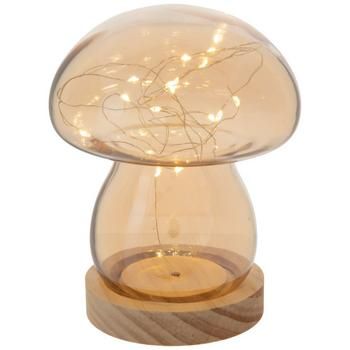 Dimensions: 6.75" H x 4.38" W x 4.38" D Power Source: 3 AAA Batteries (Not Included) Material: Glass, Wood & Metal Color: Amber, Natural & Warm White Quantity: 1 Illuminate your space with a whimsical accent like this Amber Light Up Mushroom. The mushroom-shaped glass encases a strand of warm fairy lights. Use the switch under the unfinished wood base to power it on. Place this cozy mushroom lamp in your bedroom or living room for a glowing, amber accent!   *No discounts may be applied to “your Boho Mushroom Bedroom, Mushroom Wax Melter, Dorm Decor Simple, Cute Mushroom Room Decor, Mushroom Room Aesthetic, Fairy Core Room Decor, Mushroom Decor Bedroom, Whimsical Lamps, Fairy Bedroom Ideas For Kids