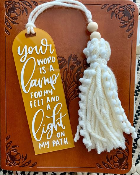 📖✨ Introducing our Bible Bookmarks! Featuring a cozy yarn tassel, and written with one of our favorite Bible Verses, Psalm 119:105: “Your word is a lamp for my feet and a light to my path” Perfect for keeping your place in your favorite devotional or scripture readings. 🌟 Whether you’re looking for a meaningful gift or a special treat for yourself, this bookmark is sure to bring a touch of inspiration to your daily routine. 🙏💖 Available now on my Etsy shop! (link in bio) And as a speci... Christian Handmade Gifts, Bible Bookmarks Diy Scriptures, Diy Christian Gift, Christian Diy Gifts, Bible Verse Bookmarks, Bible Bookmarks, Bible Bookmarks Diy, Cute Bible Bookmarks, Christian Bookmarks