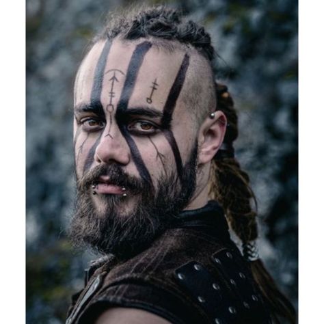 100+ Unique Viking Hairstyles For Your Inner Warrior | Man Haircuts Warrior Face Paint Men, Nordic Makeup Viking Man, Viking Warrior Makeup Men, Viking Face Tattoos For Men, Warrior Makeup Men, Viking Face Paint Men Warriors, Viking Face Paint Men, Mens Viking Makeup, Viking Paint