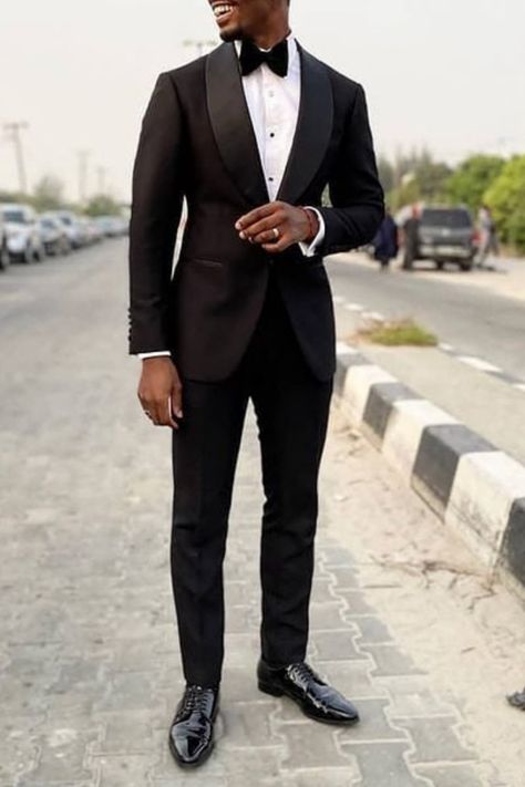 Man wearing a black tuxedo with a shawl lapel. Black Men Wedding Attire, Black Wedding Suit Groom, Black Tuxedo Wedding, Men Suit Wedding, Wedding Suits Men Black, Tuxedo Wedding Suit, Jeans Wedding, Best Wedding Suits, Wedding Groomsmen Attire