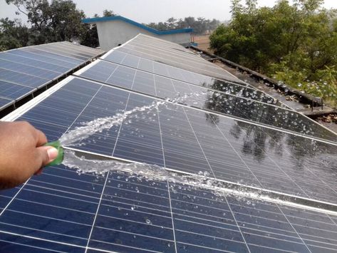 How To Clean Solar Panels To Reduce Energy Costs - Bob Vila How To Clean Solar Panels, Cleaning Solar Panels, Solar Panel Cleaning, Diy Solar Panel, Bob Vila, Reduce Energy, Solar Projects, Diy Solar, Wind Power