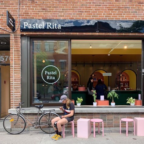 ~ Pastel Rita • Mile End, Montreal ~ 📷: IG @th3rdwave Th3rdwave | Quebec Canada | coffee shop inspiration | coffee shop aesthetic | cozy cafe | exterior design | terrace | pink coffee tables | pink stool ideas | cafe facade | bike | beautiful front store Cozy Cafe Exterior, Cafe Exterior Design, Cafe Facade, Pink Stool, Mile End Montreal, Design Terrace, Cafe Local, Stool Ideas, Cafe Exterior