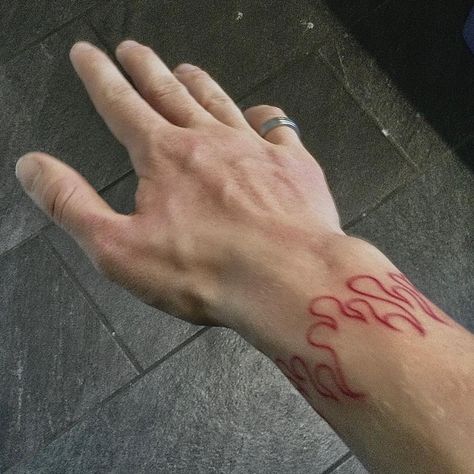 Red tattoo on wrist with a ring Red Tattoo Ideas, Red Ink Tattoo, Red Tattoo, Flame Tattoos, Sick Tattoo, Fire Tattoo, Red Ink Tattoos, Red Tattoos, Small Tattoos For Guys