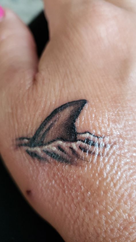 Shark And Wave Tattoo, Fish With Shark Fin Tattoo, Shark Jaw Elbow Tattoo, Shark Fin Tattoo Simple, Shark Jaw On Elbow Tattoo, Shark Fin Tattoo, Shark Mouth Elbow Tattoo, Tattoos Wave, Fin Tattoo