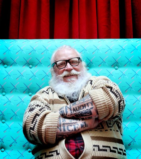 You may know Santa Claus as a jolly old man in a red suit, but in Portland, you’ll find a tattooed and pierced Santa with a man bun, Old Man With Beard, Hipster Santa, Mustache Wax, Grey Beards, Santa Outfit, St Nicolas, Santa Suits, Road Trip Adventure, Man Bun