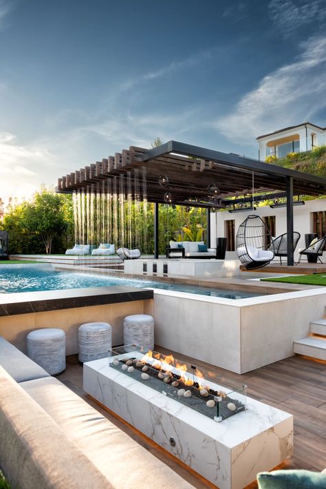 Tour This Bali-Inspired Backyard Resort - Foxterra Design Sunken Bar Pool, Sunken Backyard, Swim Up Bar Pool, Fire Pit Lounge, Sunken Seating Area, Resort Style Backyard, Villa Landscape, Luxury Pools Backyard, Rain Curtain