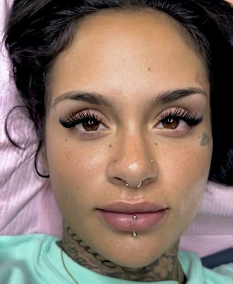 Feminine Facial Piercings, Kehlani Makeup, Lip Piercing Black Women, Paired High Nostrils, Lip Peircings Ashley, Fox Eye Lash Extensions, Kehlani Lip Piercing, India Love Nose Piercing, Kehlani Stretched Ears