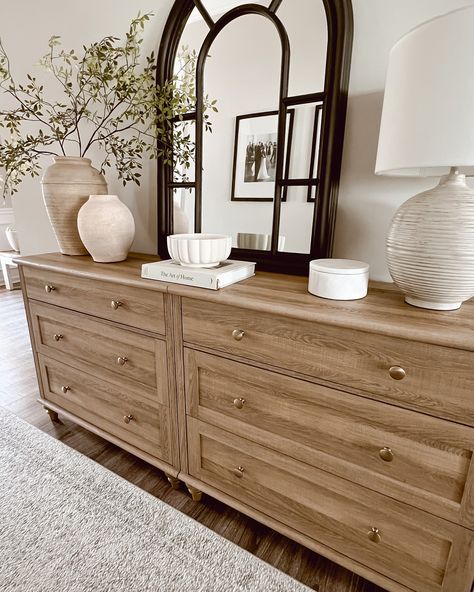 Before moving this dresser into our entryway hallway, I styled it in the front foyer. I loved the simplicity and serenity of the Neutral tones and natural textures create a calming entryway that invites warmth and peace from the moment you step inside. 🌟The first two pictures are what I styled before I decided to switch up the living room. The last three are what I ended up doing. 🤔What are your thoughts? Do you like the final result? Which one is your favorite? #HomeDecorInspo #Neutral... Buffet Table Living Room Decor, Dresser In Entryway Ideas, Clean Lines Living Room, Entryway In Living Room, Dresser In Entryway, Styled Dresser, Home Entryway Ideas, Entryway Dresser, Entryway Styling