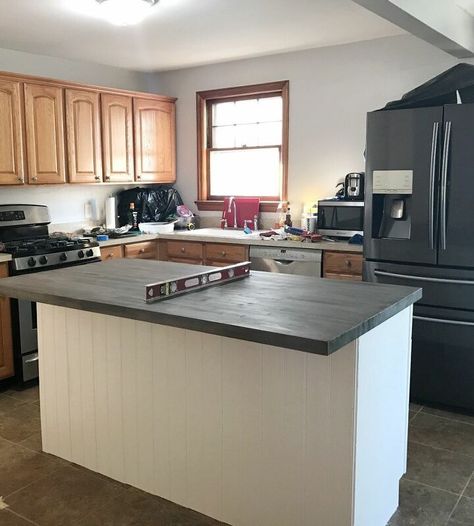 When we bought our first home our kitchen looked like this.. Needless to say that we needed it to be a bit more modern, but also we definitely needed more cabinet space.We had a Home Depot cabinet consultant come over to give us a quote and it was about $1500 for a few updates and an island so... hmmmm. No!We started the process of looking at islands made out of kitchen cabinets and didn’t find much, we got some old cabinets from Facebook marketplace. We had trouble leveling them s… Home Depot Cabinets, Diy Island, Builder Grade Kitchen, Cabinet Trim, Tv Built In, Diy Storage Bench, Rustic Kitchen Island, Counter Seating, Stock Cabinets