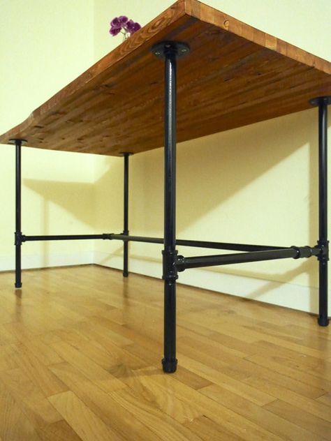 Industrial and Rustic Butcher Block Wooden Style Desk or Table supported by Black Steel Pipe Legs.  WATCH US BUILD THE TABLE: https://www.youtube.com/watch?v=xjeErlQBuDM  Stain Shown: English Chestnut Size shown: 55L x 30W x 30H  Set on a sturdy black iron pipe legs, this Industrial Desk has a richly-grained top made of Alder wood. The wood’s distinctive grain differs from table to table, with natural nicks and knots that add to its character.  Need a size not listed? Please send us a message... Industry Revolution, Industrial Wood Desk, Butcher Block Desk, Desk Industrial, Butcher Block Table, Pipe Table, Steel Dining Table, Diy Pipe, Industrial Desk