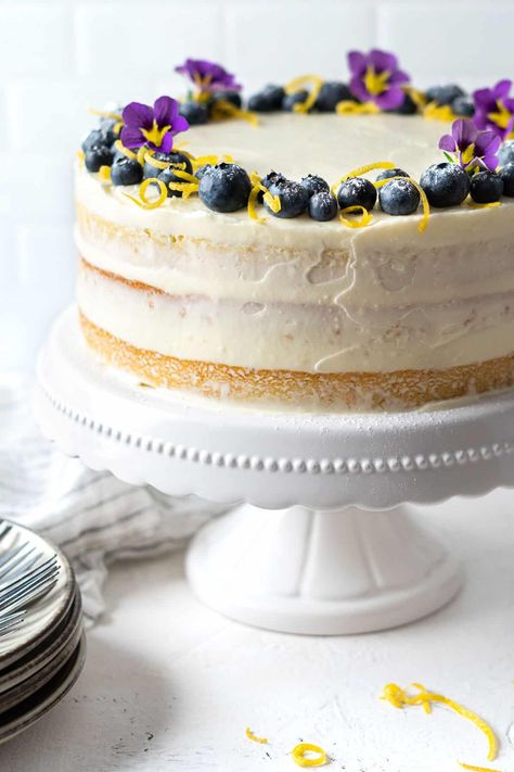 Lemon Blueberry Cake - El Mundo Eats Lemon Blueberry Wedding Cake, Best Lemon Blueberry Cake, Lemon Yogurt Cake Recipe, Blueberry Lemon Cake Recipe, Blueberry Wedding, Lemon Yogurt Cake, Lemon Blueberry Cake, Engagement Party Cake, Greek Yogurt Flavors