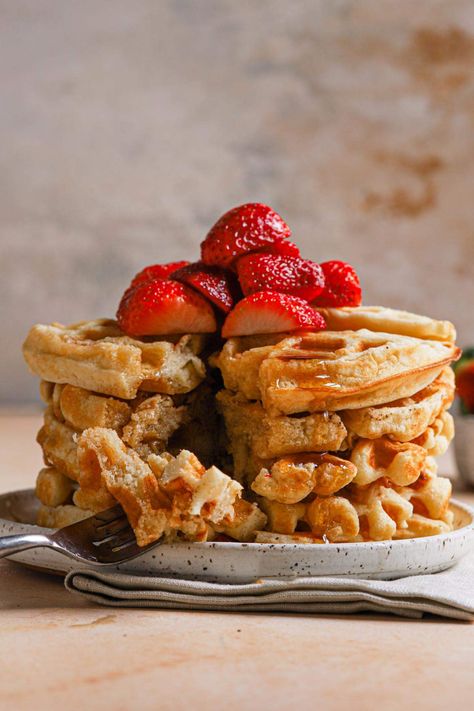 Stack of Belgian waffles with fork cut into them and strawberries on top. Butter Syrup, Belgian Waffles Recipe, Whipped Cream Desserts, Brown Eyed Baker, Fourth Dimension, Belgian Waffle Maker, Waffles Recipe, Waffle Toppings, Belgian Waffles