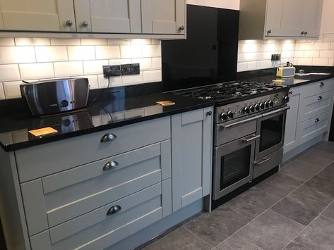 Black Counter Grey Cabinets, Grey Kitchen Black Worktop, Black Granite Worktop Kitchen, Kitchen With Black Marble Countertops, Black Worktop Kitchen Ideas, Black Marble Kitchen Countertops, Secret Basement, Black Granite Kitchen, Repainting Kitchen Cabinets