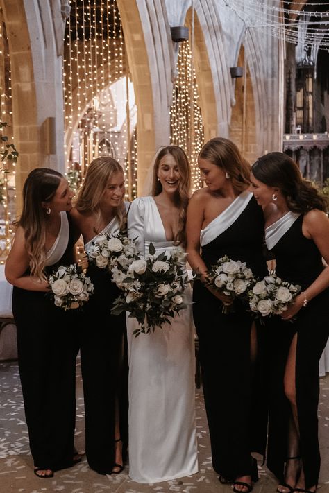 Black And Grey Bridesmaid Dresses, 1 Bridesmaid Wedding, Dark Wedding Aesthetic Bridesmaids, Black White Bridesmaid Dresses, White And Black Bridesmaid Dresses, Flowers For Black Bridesmaid Dresses, New Years Eve Wedding Bridesmaid Dresses, Nye Bridesmaid Dresses, Black Tie Wedding Colors