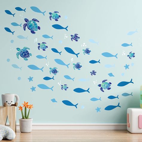 PRICES MAY VARY. Lovely design: the adorable patterns of turtles and fishes and blue color create the lively and vivid atmosphere to your room, with the removable bubbles spreading around, which could make you seem to be immersive on the scene of the ocean world Suitable size: 12 pieces sea turtles stickers and 1 sheet of blue fish wall decor set are included in this pretty ocean wall stickers combination, in which the sea turtles stickers have various sizes between 3 x 2.7 inch and 9 x 7.9 inch Under The Sea Party Decorations, Sea Party Decorations, Ocean Bubbles, Decorations For Bathroom, Turtle Nursery, Ocean Theme Classroom, Ocean Themed Nursery, Sea Nursery, Ocean Room