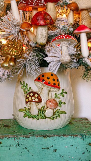 Must Love Herbs - Lauren May on Instagram: "Wait for it….. yes, that’s a Merry Mushroom canister with a fantastically fungi filled tree popping out! Merry Mushroom was made by Sears Roebuck in the 1970s! I am so glad I decided to put the tree up early! It has brought me so much joy! I’m especially excited about my new canister shaped ornament! #merrymushroom #merrymushroomcollector #vintagechristmas #home52 #mushroomdecor #fantasticfungi #kitchentree #vintagekitchen #searsroebuck #hobbithouse #hobbitcore" Merry Mushroom Sears, Mushroom House Christmas, Mushroom Cookie Jar, Sears Merry Mushroom, Mushroom Canisters In Kitchen, Canister Decor, Merry Mushroom Canisters, Love Herbs, Christmas Mushroom