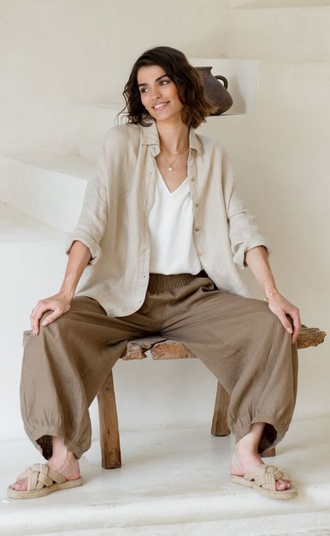 A timeless spin on the button-down, the Laguna Wheat Linen Shirt bears a casual-chic vibe. Made from OEKO-TEX® 100 French Linen with a textured weave finish, it features dropped shoulders and a relaxed fit. Complete with delicate shell buttons and functional cuffs, offering versatile styling options - wear it loose, French tucked, or unbuttoned over a tank. Pair with our Indali pants for a classic ensemble. 100% Oeko-Tex® French linen Dropped shoulders Relaxed fit Delicate shell buttons Function Linen Tshirt Outfits, Couture, Relaxed Style Women, Beige Linen Shirt Outfit Women, Linen Shirts Women Outfits Summer, Linen Shirt Styling, Drop Shoulder Outfit, Loose Fitting Outfits, Linen Outfits For Women