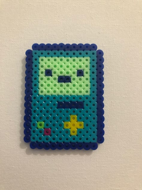 Perler Bead Gameboy, Aesthetic Fuse Bead Patterns, Peeler Bead Plant, Simple Peeler Bead Designs, Perler Beads No Black, Perler Bead Aesthetic Ideas, Cool Things To Make With Perler Beads, Perler Beads Without Black, Uno Reverse Card Perler Beads