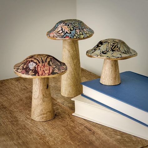 PRICES MAY VARY. AN INTRIGUING COMBINATION: This wooden mushroom set offers a unique combination of mushrooms and William Morris prints, creating a visually stunning and artistic decor piece. SET OF 3: The set includes three mango wood mushrooms, each one topped with a paper William Morris print, creating a charming and eclectic display. LACQUERED PRINTS: The William Morris prints on top of the mushrooms are lacquered, giving them a glossy and durable finish that enhances the beauty of the print Paper Mache Crafts, Wood Mushrooms, William Morris Prints, Mushroom Crafts, Morris Print, Home Decor Sculptures, Organic Ceramics, Prints Set Of 3, Mushroom Decor