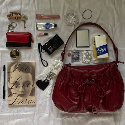 red bag, red aesthetic, cherry red, rhode liptint, toast, what’s in my bag, the lover duras Inside My Bag, Purse Essentials, Handbag Essentials, Red Purse, In My Bag, Joan Jett, What In My Bag, Bag Essentials, I'm With The Band