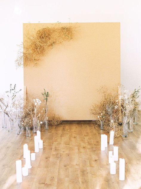 Dried Flower and Tumbleweed Ceremony Backdrop for an Indoor Desert Wedding Tumbleweed Wedding Decor, Tumbleweed Decor, Dried Grass Decor, Desert Backdrop, Sand Floor, Plant In Glass, Cinnamon Rose, Desert Ideas, Photo Backdrop Wedding