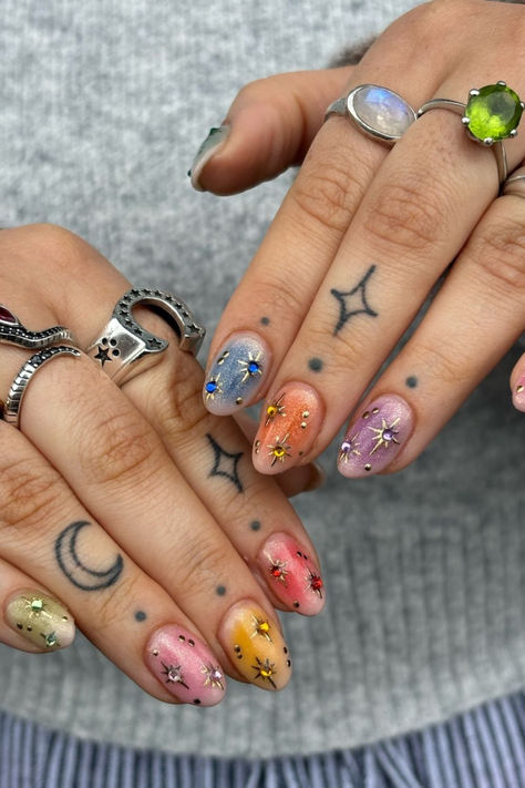 Our beautiful affordable luxury jewellery, as seen on you! ✨ IG Credit: libsfaulk Coldplay Nails Inspired, Festival Nails 2024, Eras Tour Nails Stars, Summer Colourful Nails, Coldplay Inspired Nails, Nails For Festival, Colourful Nails For Summer, Summer Nails Stars, Colourful Gel Nails