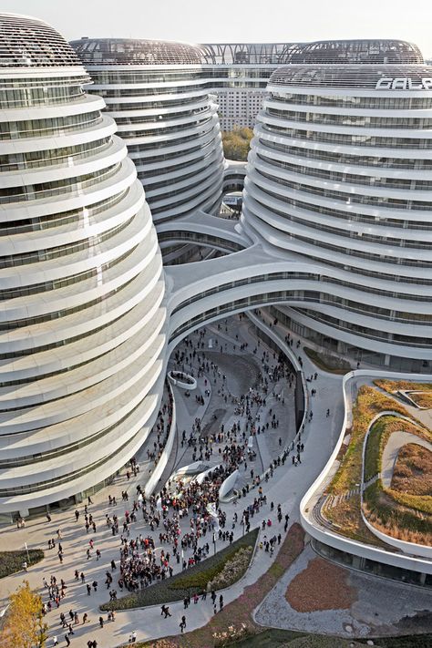 Galaxy Soho Galaxy Soho, Hadid Architecture, Architecture Cool, Zaha Hadid Architecture, Architecture Unique, China Architecture, Unusual Buildings, Zaha Hadid Architects, Interesting Buildings