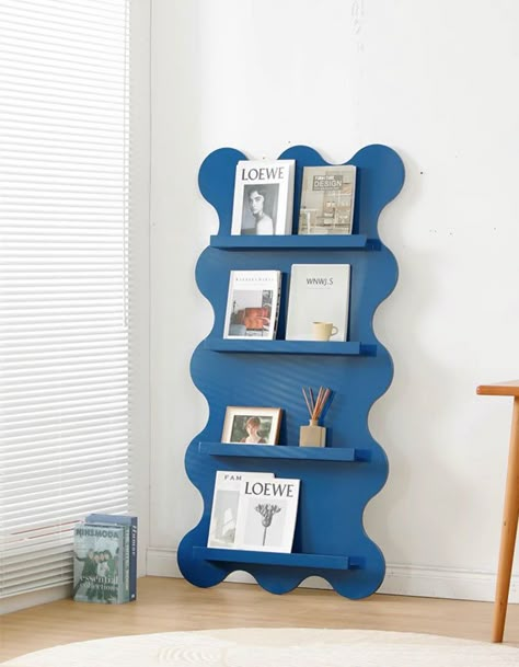 With its unique wave-like design, this bookshelf not only offers ample storage space for your favorite books and decor but also serves as an eye-catching statement piece in any room. Crafted with precision and style, the Camille Wave Bookshelf is the perfect addition to elevate your home decor. Wall Magazine Rack, Wall Magazine, Cardboard Display Stand, Bookshelf Room, Bookshelf Display, Modern Bookshelf, Funky Home, Kids Interior Room, Ideas Hogar