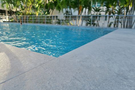 Why Choose Outdoor Porcelain Tiles for Pool Decks - Porcea Stone Choosing Pool Tile, Pool Deck Tile, Pool Paving, Porcelain Pavers, Outdoor Porcelain Tile, Paving Ideas, Pool Finishes, Pool Renovation, Landscape Stone