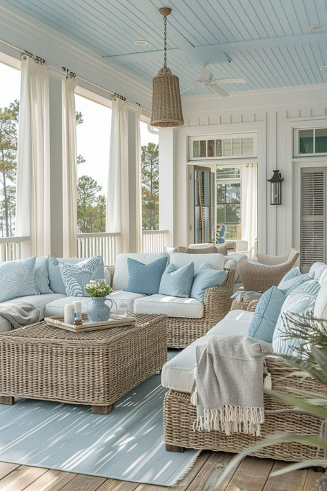 Create a seaside-inspired outdoor living room with shades of blue, neutral sandy tones, and marine decor. Utilize driftwood, seashells, and wicker furniture to establish a light, breezy atmosphere reminiscent of the beach. Consider adding a hammock or beach-style chairs to enhance the relaxed coastal vibe, making it a prime spot for relaxation. Ideal for those looking to bring the tranquil beach atmosphere to their backyard. Click or tap to explore more beach-inspired outdoor living room ideas. Outdoor Living Room Ideas, Beach House Patio, Marine Decor, Dream Beach House, Dream Beach Houses, Outdoor Living Rooms, Patio Lounge, Lounge Design, Outdoor Living Room