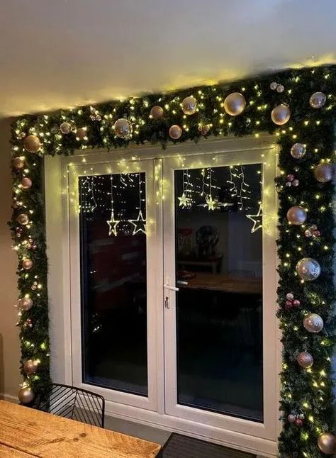 Unlike the previous collection, this Christmas decor design offers you the option for both indoor and outdoor vibes. If you’re going indoors, spice up the wall around the door with faux garlands to keep things festive without the dampness. Credit : Pinterest (@JessicaLopez) #ChristmasDoorDecor #HolidayDoorIdeas #FestiveDoorDecorations #XmasDoorArt #HolidayEntranceStyle #ChristmasWreathIdeas #FestiveFrontDoor #YuletideDoorDecor #SeasonalDoorAdornments #MerryDoorDesigns Christmas Decorations Apartment, Christmas Apartment, Christmas Window Decorations, Christmas Decor Inspiration, Christmas Themes Decorations, Diy Christmas Decorations Easy, Christmas Inspo, Christmas Decorations For The Home, Indoor Christmas Decorations