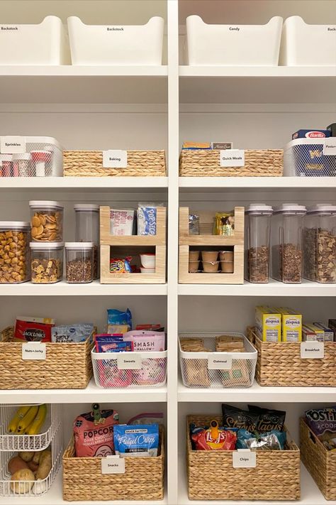 White shelving. White metal bins, woven bins, wooden stackable bins, clear cereal containers, stackable fruit bin, white labels on all categories. Pantry Categories, Playroom Closet, Pantry Layout, Home Setup, Snack Organizer, Professional Organizers, Kitchen Fridges, Hall Closet, The Home Edit