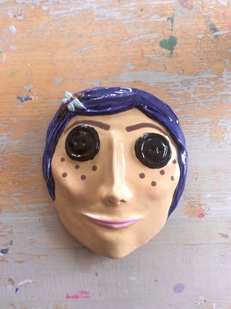 Ceramic Coraline doll mask Ceramics Face Mask, Coraline Clay Mask, Clay Mask Ceramics, Ceramics Mask Ideas, Clay Mask Ideas Art Ceramic Sculptures, Clay Mask Art Ideas, Ceramic Face Mask, Ceramic Masks Ideas Easy, Clay Masks Ceramics