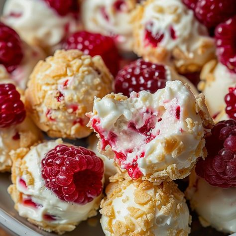 Delightful Raspberry Cream Cheese Bites Pretty Christmas Party Food, Raspberry Cream Cookies, Holiday Bite Size Desserts, Cream And Berry Filled Pastry Balls, Fresh Raspberries Recipes, Raspberry Cream Cheese Bites, Raspberry Bites, Bite Sized Desserts, Cream Cheese Bites