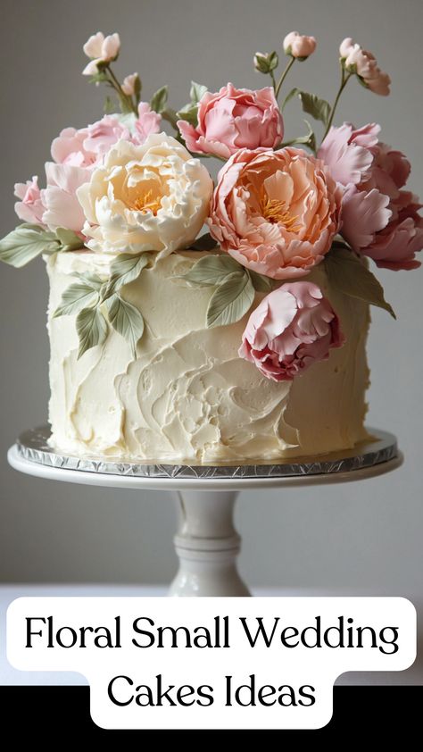 A small wedding cake decorated with pastel-colored peonies and soft buttercream, perfect for an intimate and elegant celebration. Small Wedding Cakes Wildflower, Peonies On Wedding Cake, Wedding Cakes With White Flowers, Cake Designs For Wedding Simple, Art Nouveau Cake Design, Wedding Cakes With Peonies, Floral Cakes Simple, Modern Wedding Cake Flowers, Floral Bridal Shower Cake Ideas