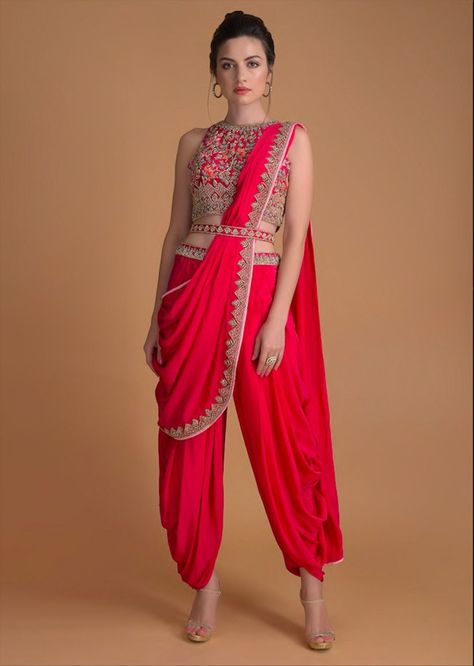 Draping a Dhoti saree for your wedding events is the latest fashion trend that's immensely raging among brides. Check out these images and get inspired. Red Color Outfits, Baju Kahwin, Wedding Salwar Kameez, Dhoti Saree, Embroidery Border, Georgette Dupatta, Colour Art, Embroidered Belt, Western Style Outfits