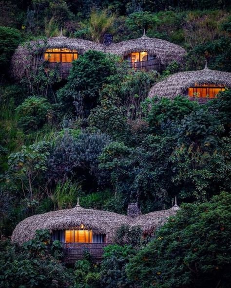 The incredible Bisate Lodge perched on the hillside. One of the most unique and wonderful places in Rwanda.   Visit Kigali 🇷🇼 (@visitkigali) • Instagram photos and videos African Lodge Design, Volcanoes National Park Rwanda, African Hut, National Park Passport, Lodge Design, Earth Bag Homes, Eco Lodges, Gorilla Trekking, Eco Hotel