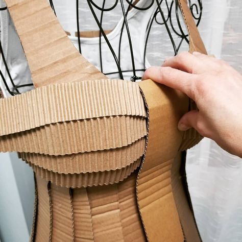 Recycle.Fold. Curve. Cut. Adjust. Glue. Repeat... Working on a wearable cardboard dress💚  #alinescardboard #cardboard #fashionweek… Cardboard Corset Pattern, Cardboard Fashion Design, Cardboard Corset, Recycled Dress Ideas Creative, Recycling Dress, Wearable Cardboard, Chess Costume, Cardboard Fashion, Cardboard Cosplay