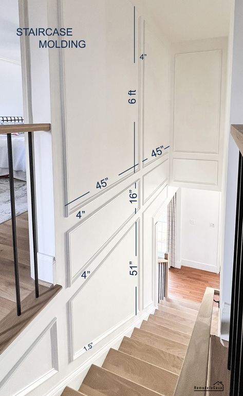 Stairs Along Wall, Grid Wall Staircase, Turned Staircase Ideas, Frame Molding Hallway, Staircase With Molding, Picture Frame Molding 2 Story Foyer, Modern Interior Staircase, Foyer Wall Molding, Picture Molding On Stairs