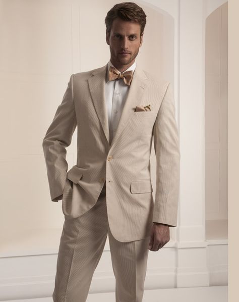 tan w/ brown, not a traditional grooms tuxedo, yet still classy look, love the vintage preppy w/ bowtie. Beige Groom, Tan Tux, Tan Suits, Summer Ceremony, Bow Tie Suit, Beige Suit, Wedding Tux, Men's Tuxedo, Groom Bowtie