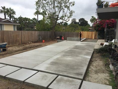 Concrete patio for the backyard right after it was poured. It is a major part of our backyard relandscape with a modern, efficient, mid-century design. Backyard With Cement Patio, Full Concrete Backyard, Mid Century Concrete Patio, Concrete Pads Backyard, Landscape Around Concrete Patio, Concrete Slabs Patio, Plain Concrete Patio Ideas, Backyard Concrete Patio Ideas Cement Outdoor Spaces, Modern Concrete Patio Ideas