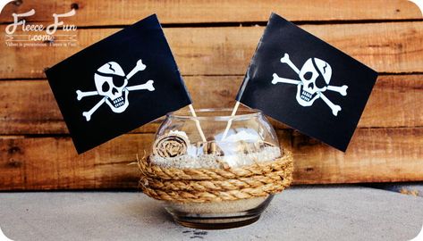 Pirate Party Centerpiece Printable - If you need table decoration ideas for a pirate birthday party theme, try this Pirate Party Centerpiece Printable that is part of fun DIY table centerpieces you will love. Homemade table decorations are a great way to add some personality and your own unique mark on the celebration. This printable adds the perfect finishing touch to these centerpieces. Guests will be amazed at the time and creativity you put into the details of the party. Pirate Party Centerpieces, Table Centerpieces Birthday, Pirate Centerpiece, Diy Table Centerpieces, Pirate Party Ideas, Centerpieces Birthday, Homemade Table, Pirate Wedding, Table Centerpieces Diy