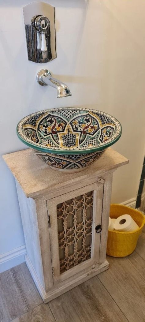 Moroccan Sinks: A Unique and Elegant Addition to Your Home Moroccan sinks, also known as Moroccan-style vessel sinks, are a beautiful and functional addition to any bathroom or kitchen. These sinks are inspired by the intricate and colorful designs found in Moroccan architecture, which has been influenced by various cultures throughout history. The beauty of Moroccan sinks lies in their intricate designs, which often feature vibrant colors and intricate patterns. These sinks are made from a vari Moroccan Sink Bathroom, Turkish Bathroom Ideas, Bathroom Moroccan Style, Small Sink Ideas, Modern Moroccan Bathroom, Moroccan Style Interior Design, Moroccan Style Bathroom, Moroccan Inspired Bathroom, Morocco Home