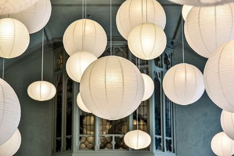 LED bulbs inside paper lanterns. Clustered from a vaulted ceiling. Paper Orb, Paper Lantern Chandelier, Paper Lights, Orb Pendant Light, Lantern Pendant Lighting, Paper Lantern, Lantern Pendant, Light Installation, Paper Lanterns