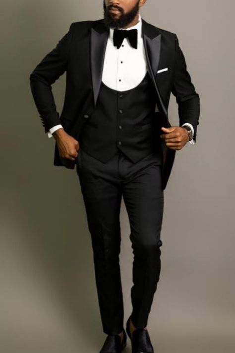 Man wearing a black tuxedo outfit. Three Piece Tuxedo Wedding Black, Three Piece Tuxedo Wedding, Black Three Piece Suit Men, Three Piece Tuxedo, Black Three Piece Suit, Designer Tuxedo, Black Tuxedo Jacket, Black And White Suit, Suit Combinations