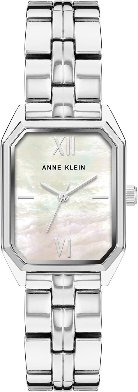 Mineral crystal lens Mother-of-pearl dial with silver-tone hands and markers Silver-tone adjustable link bracelet; jewelry clasp and extender Water resistant to 100 feet (30M) Silver Bracelet Watch, Quartz Dress, Anne Klein Watch, Bracelet Watches Women, Ceramic Watch, Old Watches, Metal Straps, Jewelry Clasps, Dress Watch